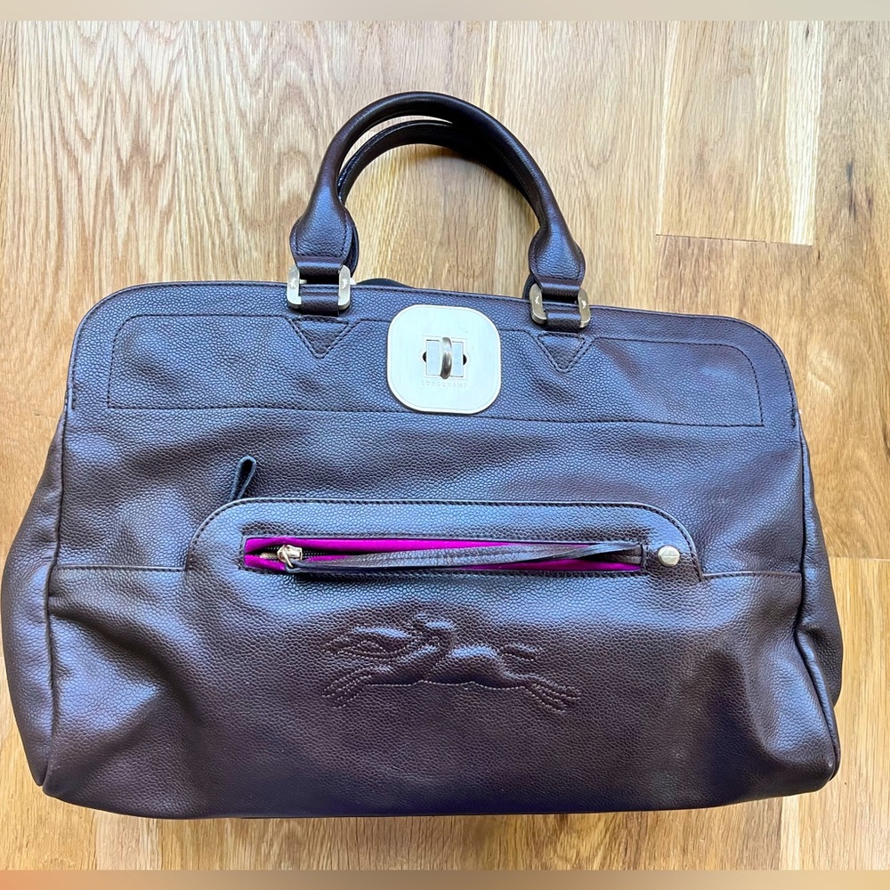 Authentic Longchamp leather top handle bag. Brown. Gold tone hardware.